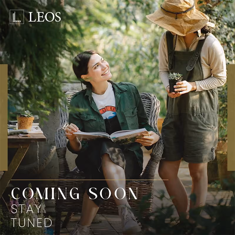 LEOS teaser creative captioned Coming Soon Stay Tuned, showing two people gardening on a planted terrace