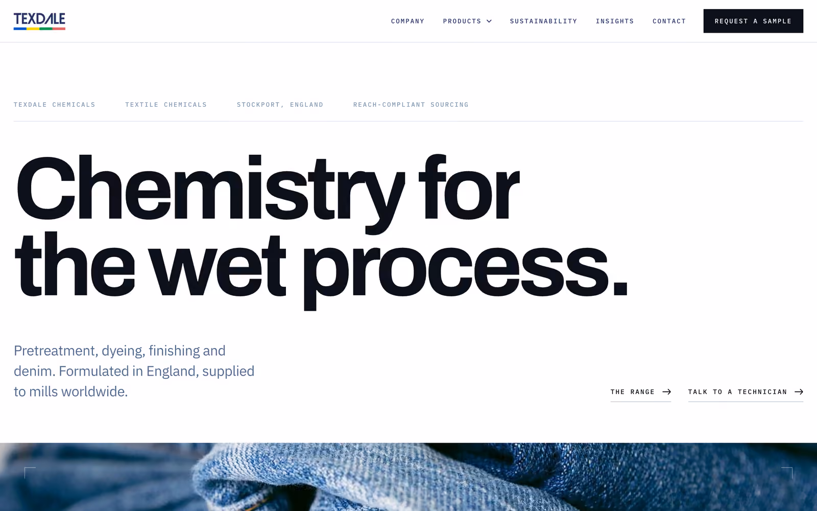 The Texdale website hero: Chemistry for the wet process, above folded indigo denim